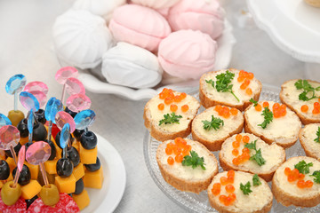 Set of cold snacks, canape and dessert, closeup