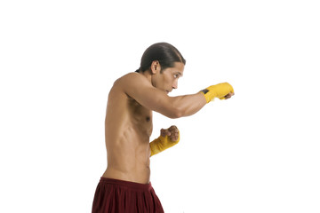 male boxer on punching stance side view