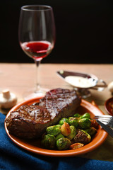 Grilled steak with vegetables, closeup