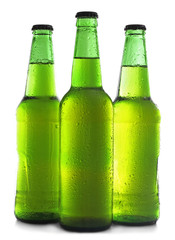 Bottles with fresh beer isolated on white