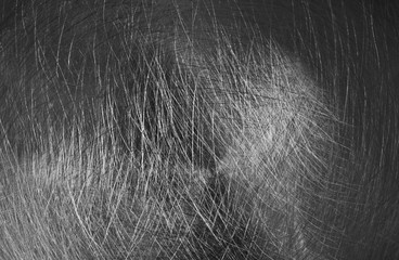 Polished metal background, close up