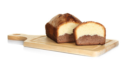 Delicious sweet cake bread on wooden cutting board isolated on white