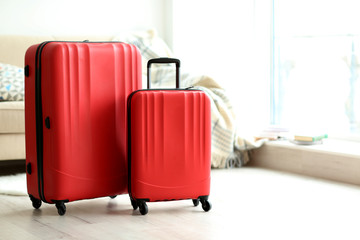 Large red polycarbonate suitcases, close up