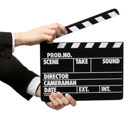 Male hands holding a movie clapperboard, on white background