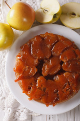 Tarte Tatin with apples and caramel close up. vertical top view 
