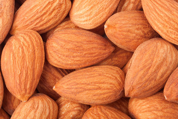 nuts peeled almonds as a background close-up macro