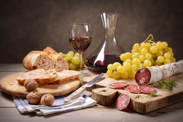 Salami, grapes and red wine
