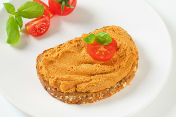 Slice of bread with vegetarian spread