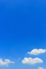 fluffy cloud on clear blue sky