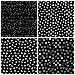 Black and white chaotic ethnic geometric seamless patterns set, vector