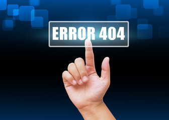 Hand pressing error button on blue technology background 