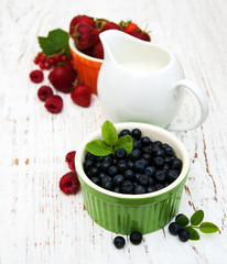 Fresh berries with milk