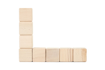 Wooden toy cubes isolated on a white