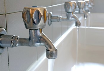 taps with water coming out