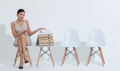 Beautiful woman is expressing shock towards papers