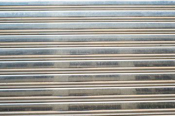 Obraz premium Stainless steel rolled door