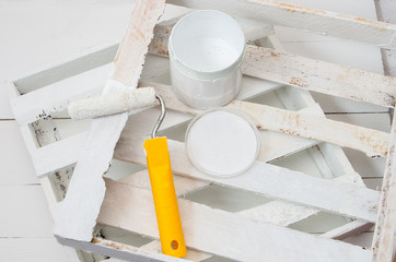 painting roller and white paint