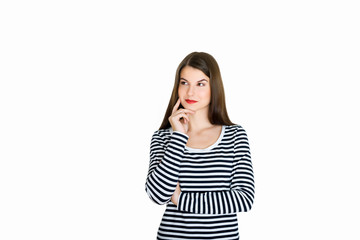 Attractive young woman deep in her thoughts, on white background