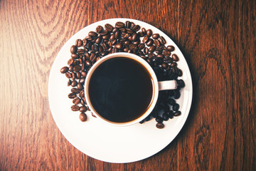 Coffee beans on saucer top