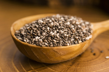 chia seeds on wooden spoon