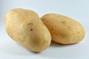 Potatoes on white background.
