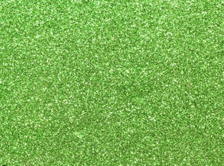 uniformly glitter green background and shimmering shiny texture