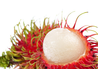 Rambutan with leaves isolated on white background