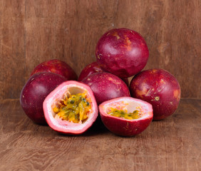 passion fruit isolated on wooden background.