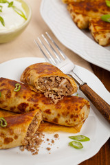 Blintzes or Russian Pancakes with Meat. Selective focus.