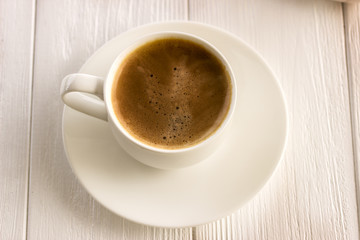  cup of coffee on a white wooden board
