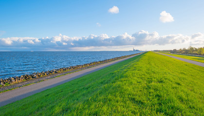Dike along a lake in spring