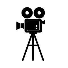 Obraz premium Black movie camera on white background