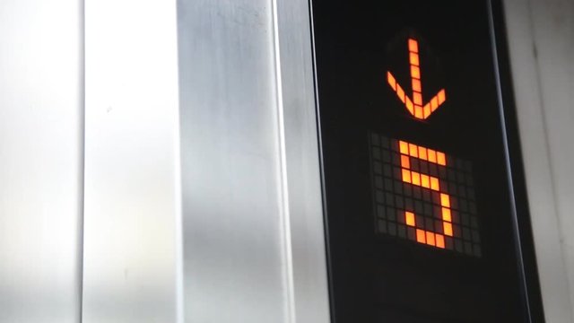 elevator digital screen show that the elevator is going down