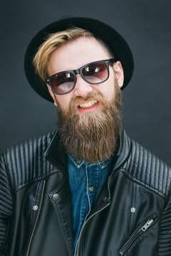 Portrait of hipster man in a studio