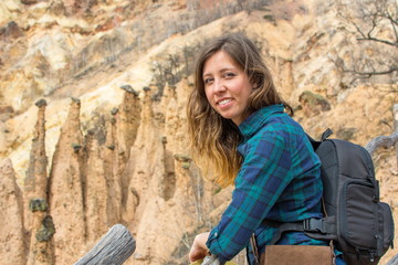 Woman hiker with backpack outdoors