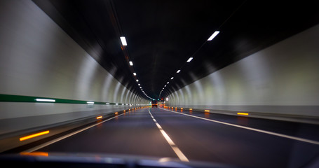 driving fast in a tunnel on the highway