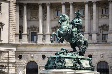 Fototapeta na wymiar Prince Eugene of Savoy statue with the Hofburg Palace in Vienna, Austria