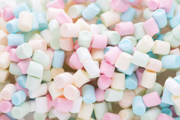 Background or texture of colorful mini marshmallows.