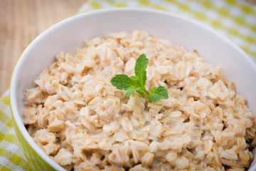 Oatmeal porridge with blueberries. healthy breakfast.