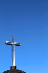 cross symbol and deep blue sky