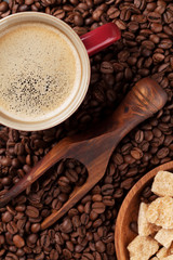 Coffee cup, beans and brown sugar