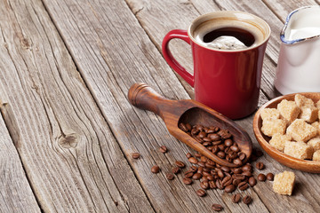 Coffee cup, beans and brown sugar
