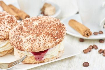 Coconut cakes with cherry and creamy filling