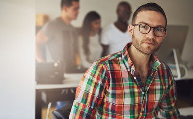 Serious handsome business owner