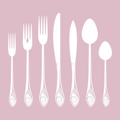 set of silver plate on pink background