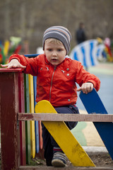 The three-year young boy on the playground