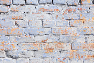 Aged colourful brick wall background