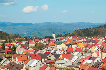 Fototapeta na wymiar Panoramic view of Croatian town Delnice, Gorski Kotar in spring 