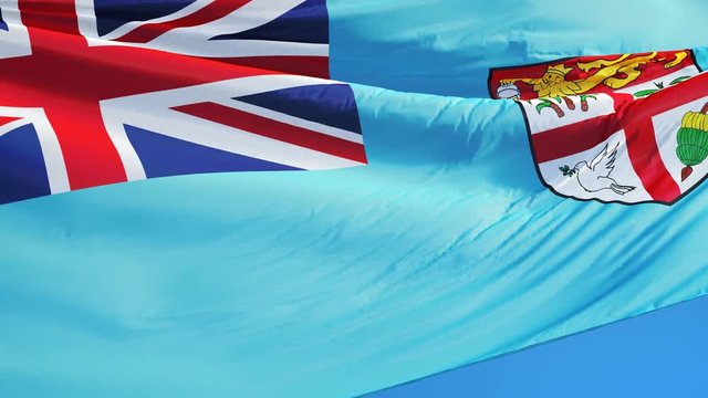 Fiji flag waving in slow motion against clean blue sky, seamlessly looped, close up, isolated on alpha channel with black and white luminance matte, perfect for film, news, digital composition