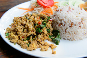 Rice topped with stir-fried pork and basil